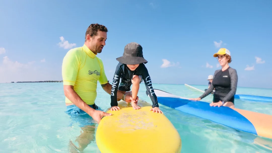 learn to surf in Maldives at Kandooma surf resort