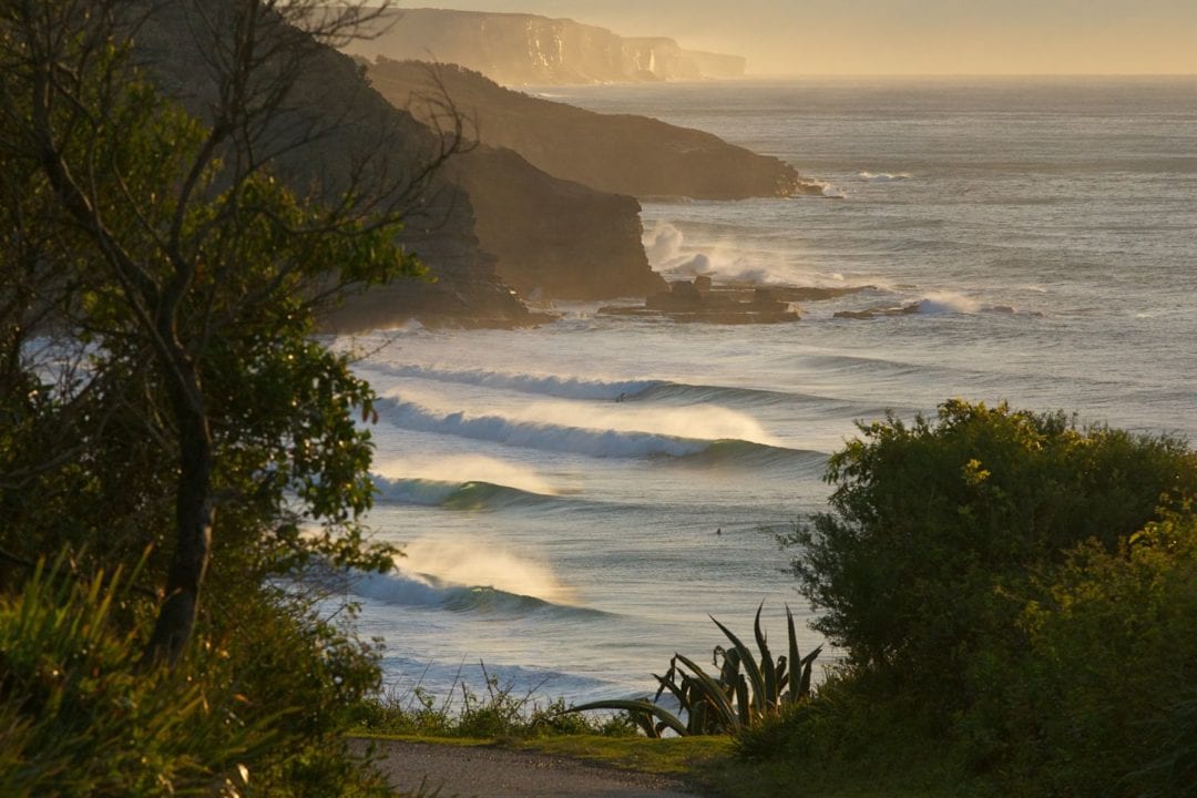 An amazing capture of an ENE swell lining up, looking towards the Royal National Park. Photo Clarrie Bouma.
