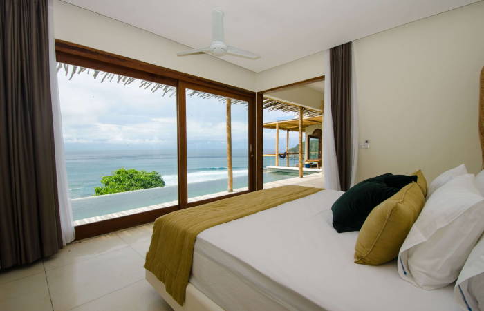 Welcome to the luxurious, all-inclusive Kini Villa, where awe-inspiring beauty and opulence converge to create the ultimate sanctuary for your family vacation. Awaken each morning to breathtaking 180-degree views, as the vibrant landscape unfolds at the foot of your bed, beckoning you to embrace the day. As the sun journeys across the sky, immerse yourself in the mesmerizing panorama from the edge of your private infinity pool…